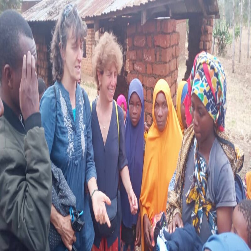 One of our donors exchanging ideas with the beneficiaries.